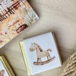 Bomboniera cowboy con cavallo a dondolo